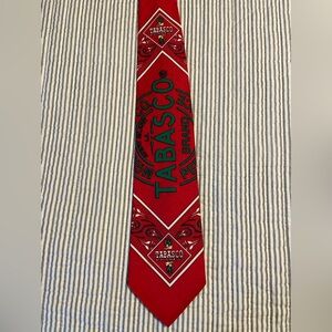 Vintage Tabasco necktie, bright red w/logo in center. 100% cotton.